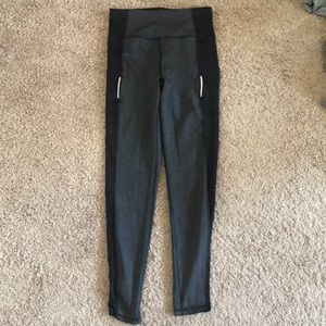 Black/grey meshed leggings,side pockets on legs.